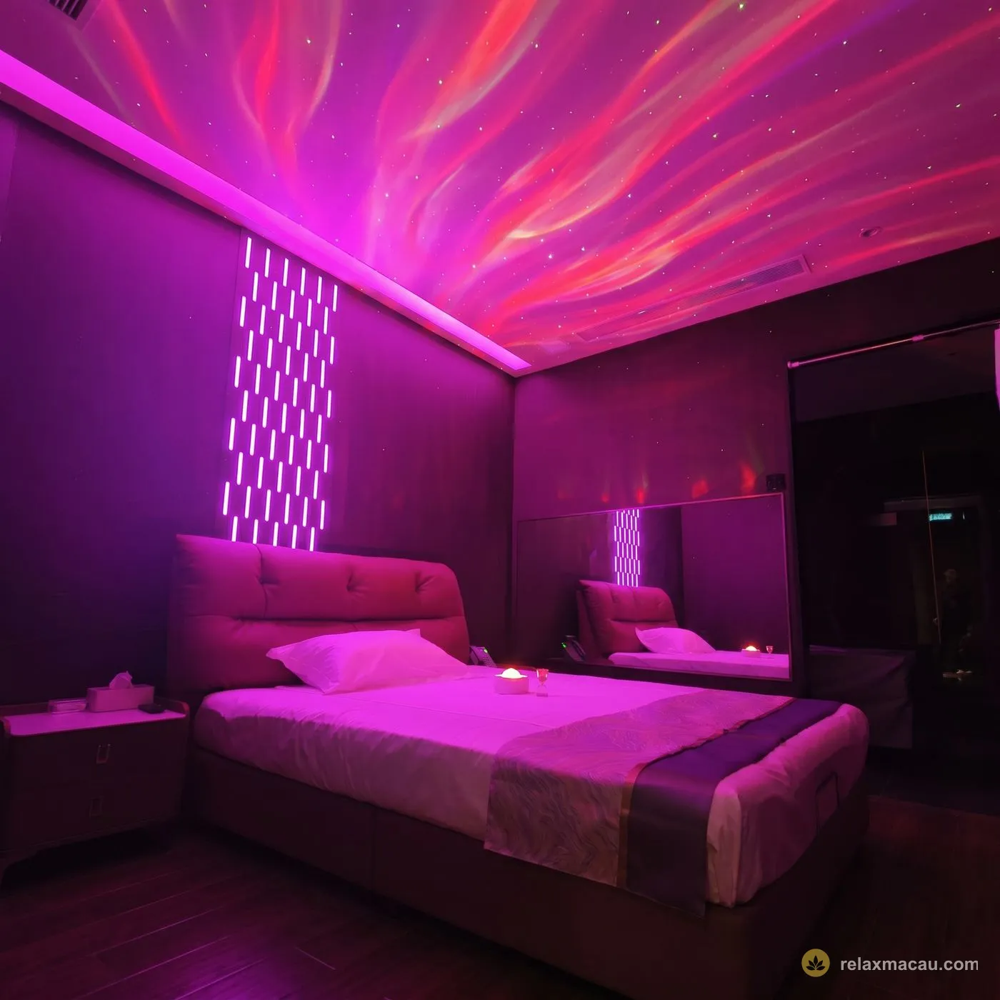 Number Nine Spa purple-light bedroom