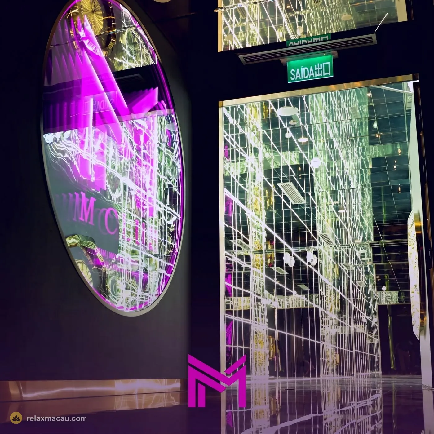 M Club neon M-logo entrance